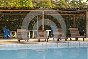 Sun bed near the pool in the resort, Brazil