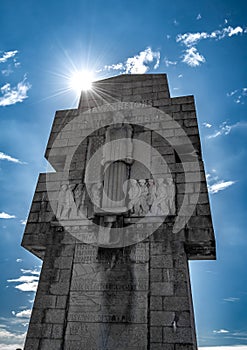 Sun Behind Monument Aux Bretons De La France Libre At Pointe De Penhir At The Finistere Atlantic Coast in Brittany, France