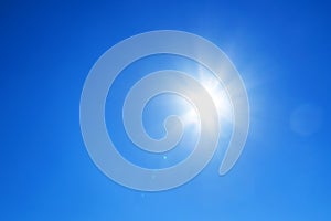 Sun with blue sky