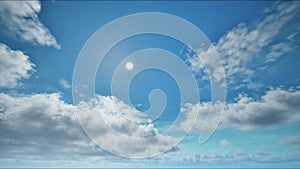 Sun on the blue sky with moving clouds in the day time