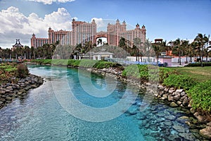 Sun, blue sky and puffy clouds at Atlantis hotel, Paradise Island, Bahamas