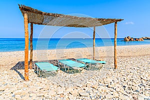 Sun chairs on Potami beach, Samos island, Greece