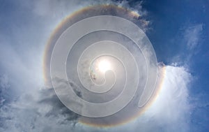 Sun with circular rainbow