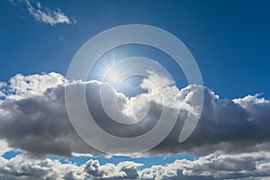 Sun and cloud in the sky.