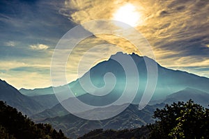 Sun and cloud on top of Mount Kinabalu, Sabah, Borneo