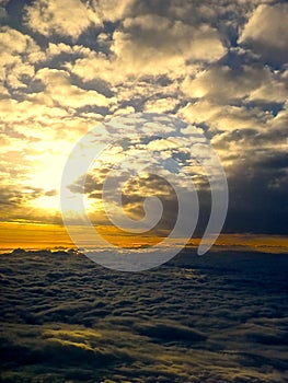 Sun in between clouds