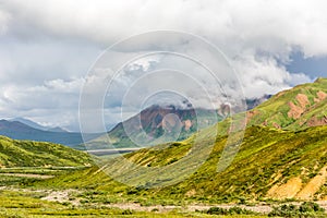 Sun and Clouds Over Denali`s Alaska Range