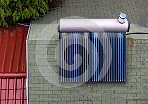 Sun collector panel on house roof