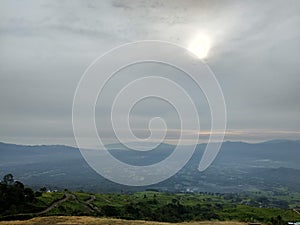 Sun covered cloud above Dempo Mountain