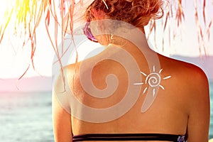 Sun cream, advertisement poster with sunblock lotion on human shoulder