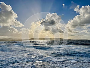 Sun dancing on the waves at Downpatrick Head, County Mayo, Ireland