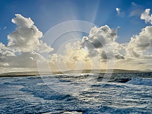 Sun dancing on the waves at Downpatrick Head, County Mayo, Ireland