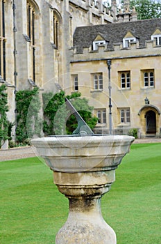 Sun Dial with building in background