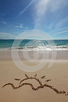 Sun drawing on a beach