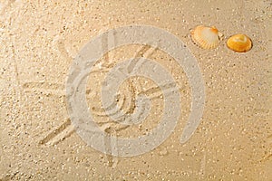 Sun drawn in the sand