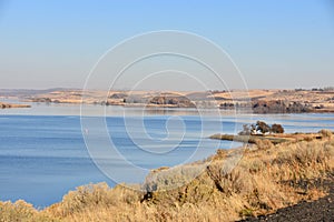 Sun-drenched Sage overlook the Cerulean Waters of the Snake River near Charbonneau Park photo