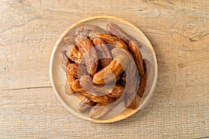 Sun dried banana on plate