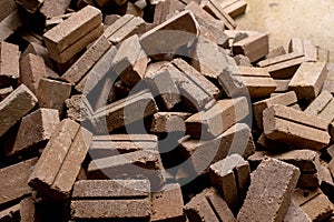 sun dried clay or mud bricks scattered at a work site in Malaysia