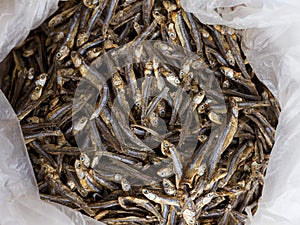 Sun dried dilis or anchovy inside a plastic bag at a dry fish market in the Philippines