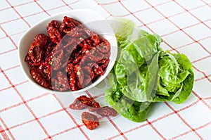 Sun dried tomatoes and lettuce