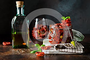 Sun-dried tomatoes with olive oil in a jar