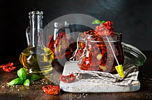 Sun-dried tomatoes with olive oil in a jar