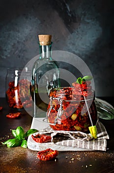 Sun-dried tomatoes with olive oil in a jar