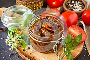 Sun dried tomatoes with olive oil in a jar