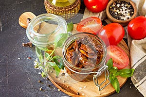 Sun dried tomatoes with olive oil in a jar