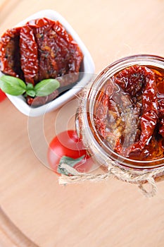 Sun dried tomatoes with olive oil in a jar