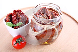 Sun dried tomatoes with olive oil in a jar