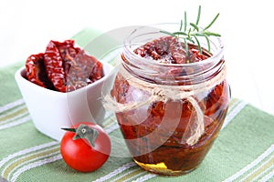 Sun dried tomatoes with olive oil in a jar