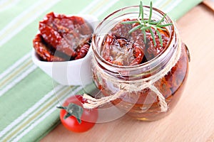 Sun dried tomatoes with olive oil in a jar