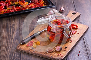 Sun dried tomatoes with olive oil in a jar
