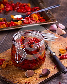 Sun dried tomatoes with olive oil in a jar