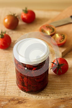 Sun dried tomatoes with olive oil in a jar.