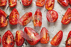 Sun dried tomatoes on white baking paper