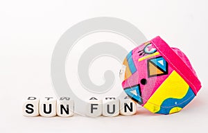 Sun and fun black text with sun visor cap on white background