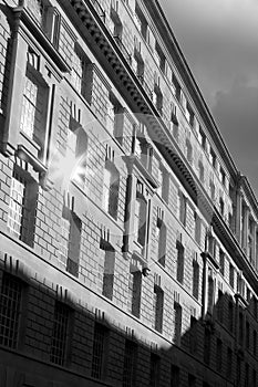 Sun glinting in the window of a London building