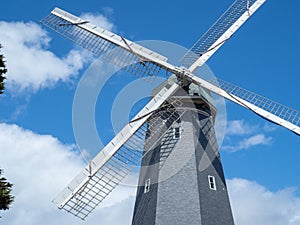 Sun glowed windmill rotating in the outdoors photo