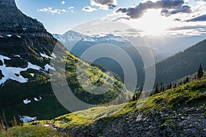 Sun Glows Over Green Montana Mountains