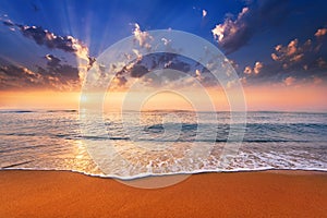 Sun goes down at sea.