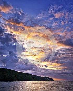 The sun goes up on the beach of Sellin. In the background is the Cliff of the famous Baltic Sea in Sellin. Island RÃ¼gen