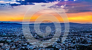 Sun going down over the city of Queretaro Mexico. photo
