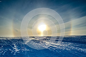 Sun Halo above ice shelf. Antarctica