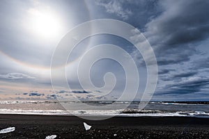 Sun halo on the shore