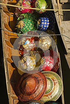 Sun hats at the Damnoen Saduak floating market in Thailand.