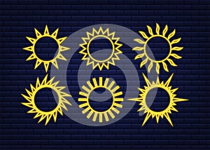 Sun icon doodles isolated on blue background. Summes season. Sun neon set.