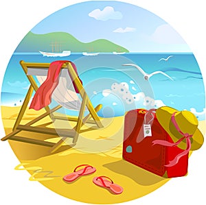 Sun lounger and suitcase on the beach