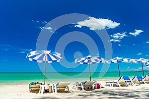 sun lounger and umbrella at White Sand Beach